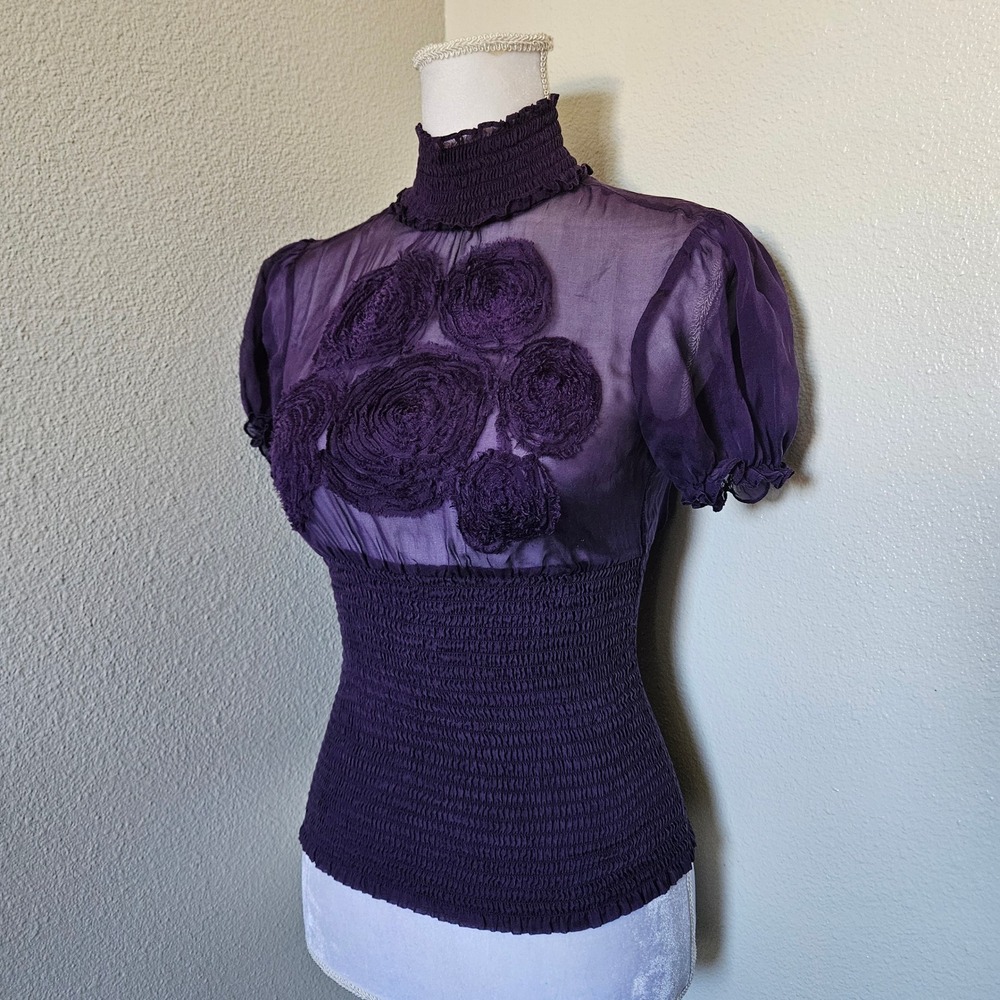 Bebe Silk Sheer Rosette Blouse Purple Smocked Mock Neck Puff Sleeve Top